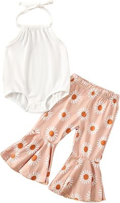 two pieces of clothing, one white top and the other pink with sunflowers