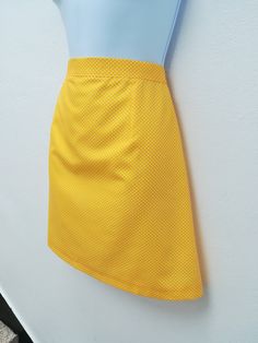 "NOELLE SKIRT Handmade skirt 65% Polyester 35% cotton Color: yellow This skirt is also available custom made! We need to know: waist, hips, length Sizes XS: CHEST 84 CM / WAIST 66 CM / HIPS 90 CM S: CHEST 88 CM / WAIST 70 CM / HIPS 94 CM M: CHEST 92 CM / WAIST 74 CM / HIPS 98 CM L: CHEST 96 CM / WAIST 78 CM / HIPS 102 CM XL: CHEST 100 CM / WAIST 82 CM / HIPS 106 CM XXL: CHEST 104 CM / WAIST 86 CM / HIPS 110 CM *Notice that the pictures are made by professionals and prepare for the best look on t Retro Fitted Short Skirt, Fitted Retro Style Mini Skirt, Retro Cotton Mini Skort, Fitted Retro Cotton Mini Skirt, Retro Cotton Mini Skirt, Retro Fitted Cotton Skort, Retro Cotton Skort In Short Length, Vintage Cotton Fitted Mini Skirt, Cotton Retro Skort