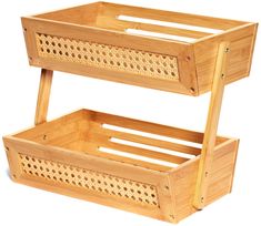 two bamboo baskets stacked on top of each other with holes in the bottom and sides