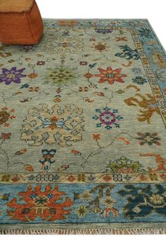 an area rug with various colors and designs