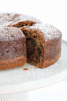 a cake that is cut in half on a plate