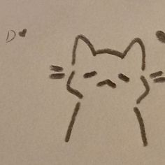 a drawing of a cat's face with the word d on it