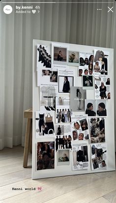 a white board with many pictures on it in front of a curtained window and wooden floor