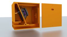 an open yellow box with a camera inside