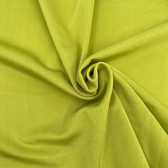 a close up shot of the fabric in lime green, which is very soft and bright