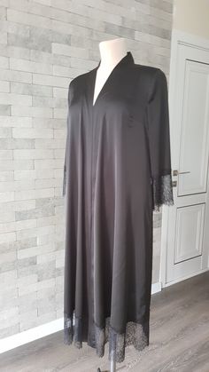 Black luxurious wedding robe, to add a perfect touch to your perfect and unique day. It can be made of high quality satin called Italian silk or natural silk. Only high quality fabrics and high finishing used for making the robe as neat as it can be. Please find the wedding robes collection here https://www.etsy.com/shop/LidiasBoutiqueDesign?ref=seller-platform-mcnav&section_id=25023222. For wedding dresses, please access https://www.etsy.com/shop/LidiasBoutiqueDesign?ref=seller-platform-mcn Elegant Satin V-neck Kimono, Elegant Long Satin Robe, Elegant V-neck Kimono For Wedding, Elegant V-neck Wedding Kimono, Elegant V-neck Robe For Evening, Elegant Satin Kimono For Wedding Night, Elegant Open Front Kimono For Wedding, Elegant Dresses With Lace Sleeves For Wedding Night, Elegant Wedding Night Dress With Lace Sleeves