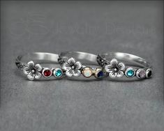 Birthstone Flower Ring - (choose # of stones) – LE Jewelry Designs Unique Mothers Rings, Mothers Rings, Birthstone Ring Mothers, Mothers Ring, Mixed Metal Rings, Nature Inspired Rings, Ring Flower, Mother Rings, Synthetic Opal