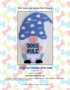 a cross stitch pattern for a dog wearing a blue hat