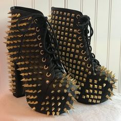 Black And Gold Jeffrey Campbell Lita Spike. Worn Only 1 Time. No Spikes Missing. I Do Not Have The Original Box, Dust Bag Or Extra Spikes. Size 5. Black Punk Round Toe Heels, Black Punk Style Heels With Round Toe, Black High Heel Boots With Rivets, Edgy Black Heels With Rivets, Edgy Heels With Rivets And Round Toe, Black Studded High Heel Boots, Punk Heels With Spikes And Round Toe, Punk Spiked Round Toe Heels, Black Heels With Rivets And Round Toe