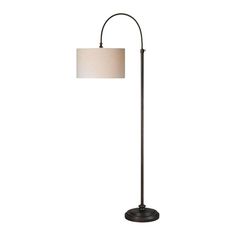 a floor lamp with a white shade on the base and a black metal pole,