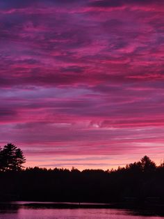 the sky is pink and purple in color