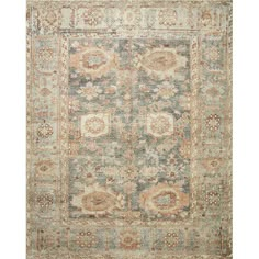 an antique rug with many different colors and patterns