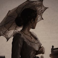 a woman with an umbrella in her hand