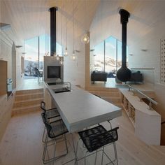 the kitchen is clean and ready to be used as a living room or dining area