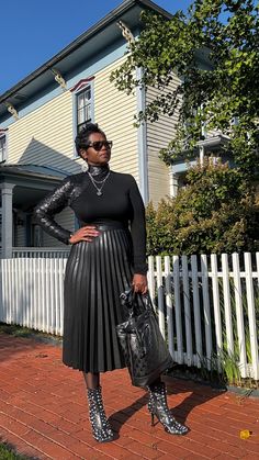 Pleated leather skirt with elastic waist band Pleated Leather Skirt Outfit, Long Leather Skirt Outfit, Pleated Skirt And Sweater, Pleated Leather Skirt, Cogic Fashion, Satin Pleated Skirt, Leather Skirt Outfit, Leather Pleated Skirt, Black Leather Skirts