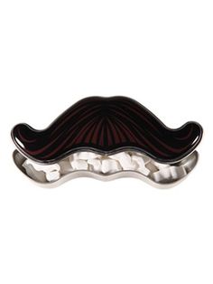 a black and white mustache shaped broochle