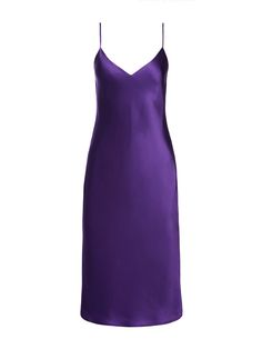 An effortlessly elegant slip dress in a lustrous silk charmeuse and a violet hue. Bias-cut silk falls in a subtle cling over the figure, enhancing the silhouette. Design includes clean V-neck and adjustable spaghetti straps. No closures. 100% Silk. Elegant Slip Dress, V Neck Slip Dress, Dress Crafts, Natural Curves, Silk Charmeuse, Silk Slip, Silhouette Design, Luxury Women, Athletic Tank Tops