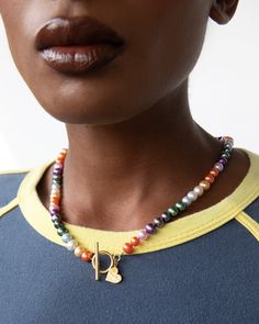 This eclectic and colorful collection of fresh water pearls is a great balance of high end quality and humble earth tones. Featuring a classic toggle clasp that sets this necklace apart from out original Multi Color Pearl necklace, this necklace gives you the perfect opportunity to show off your unique and exquisite style. * Multicolor Freshwater Pearls * Toggle Clasp Detail * 18k Gold Plated Findings * Sizes Available * Handmade in Los Angeles Multi Color Pearl Necklace, Multicolor Beaded Necklace With Pearl Pendant, Toggle Clasp Necklace With Round Beads, Elegant Multicolor Beaded Necklaces With Pearl Charm, Elegant Multicolor Beaded Necklace With Pearl Charm, Multicolor Pearl Charm Necklace For Gifts, Toggle Necklace With Round Beads For Gifts, Multicolor Necklaces With Pearl Charm As Gift, Elegant Multicolor Beaded Necklaces For Everyday