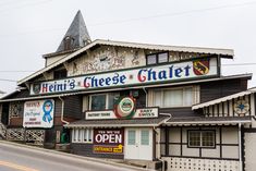 an old building with many signs on it