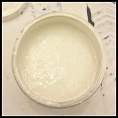 a white bowl sitting on top of a table