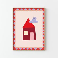 a red house with a bird flying over it's head on a white wall