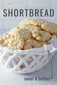 a white bowl filled with shortbread cookies