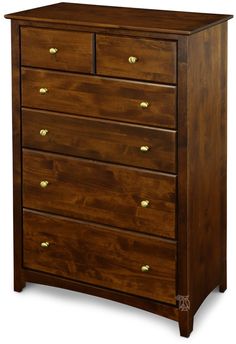 a wooden dresser with four drawers and brass pulls on the bottom drawer, against a white background