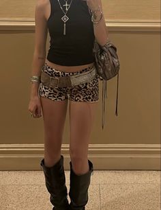 Teddy Outfit Lace, Black Top Concert Outfit, Weho Night Outfit, Shorts With Leggings Underneath, Snake Print Shorts Outfit, Cochella Outfits Inspiration 2024, Festival Boots Outfit, Summer Outside Concert Outfit, Edm Party Outfit