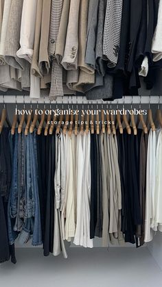 an organized closet with clothes hanging on racks and the words how to organize your wardrobes