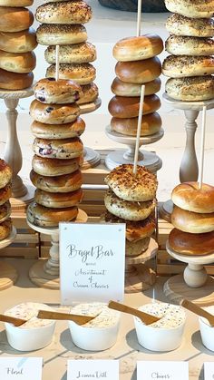 donuts and other pastries on display in a bakery