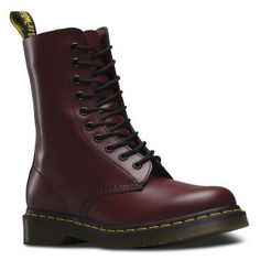 The 1490 10-eye boot is a classic Dr. Martens punk silhouette — laced even higher for an amped-up attitude. 10-eye boot Made with classic Doc's DNA, including grooved edges, yellow stitching and heel-loop Built on the iconic Dr. Martens air-cushioned sole, which is oil and fat resistant, with good abrasion and slip resistance Material: Airwairs original signature leather: a firm, finished leather with a smooth, semi bright appearance. Care Instructions: [Smooth] = Clean Away dirt using a damp cl Red Leather Boots, Stacked Heel Boots, Real Leather Boots, Doc Martens Boots, Genuine Leather Boots, Dr Martens Boots, Mens Leather Boots, Boots Uk, Classic Heels