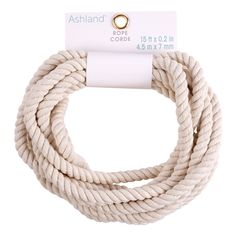 a white rope with a gold hook on it's end and a tag hanging from the