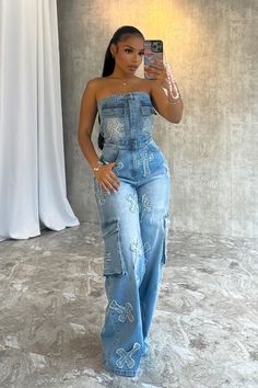 Washed denim tube jumpsuit featuring cross patch design and pocket details Baggy wide leg fit Fly button and zipper closure with an elastic waistband We recommend wearing pasties, a strapless bra, or no bra with this garment Runs true to size Cute Simple Outfits Casual, Denim On Denim Outfits For Women, Denim Dress Outfit Black Women, Classy Fashion Aesthetic, Denim Set Outfit, Denim Outfit Black Women, Denim Birthday Outfit, Jean Jumpsuit Outfit, Denim Outfits For Women