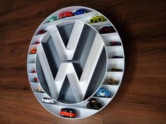 a vw logo made out of toy cars