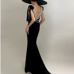 Black Velvet Gown With Pearl Dec. Never Worn. Black Velvet Dress With Pearls, Elegant Backless Evening Dress For Banquet, Elegant Backless Banquet Gown, Black Backless Evening Dress For Formal Occasions, Black Backless Formal Evening Dress, Formal Black Backless Evening Dress, Backless Black Formal Evening Dress, Elegant Black Backless Gown, Elegant Black Evening Dress With Sweep Train