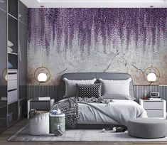 the bedroom is decorated in grey and white with purple flowers hanging from the wall above it