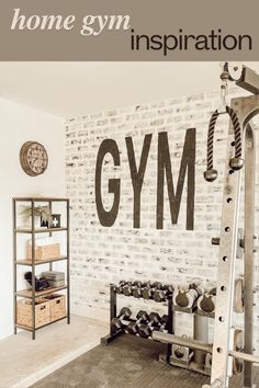 there is a gym wall with the word gym written on it in black and white