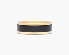 a black and gold wedding ring on a white background