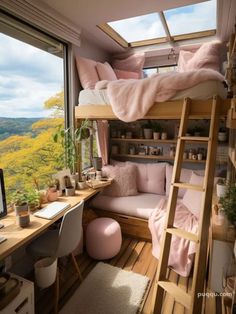 a bedroom with a bunk bed and desk in the corner next to a large window