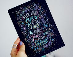 a person holding up a card with the words, never you see stars and get on the ground