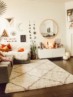 a living room filled with lots of furniture and decor