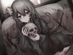 a girl holding a skull in her hands and looking at the camera with an evil look on her face