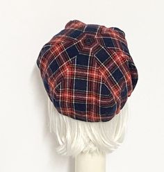 Newsboy Hat Plaid Red Vintage Wool, lined in black taffeta, the top of the hat has 6 section crown, a one piece brim and has a soft 1" elastic band inside. One size fits most up to 22" Made in USA Dry Clean Red Flat Cap For Fall, Classic Adjustable Mini Cap Hat, Red Classic Flat Cap, Classic Red Flat Cap, Retro Red Flat Cap, Plaid Beret, Red Newsboy Hat, Red Adjustable Winter Beret, Adjustable Red Winter Beret