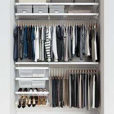 an organized closet with clothes and shoes