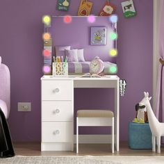 a bedroom with purple walls and lights on the wall, a white vanity table topped with a toy horse next to it