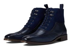 Stacy Adams Malone Wing Tip Lace-Up Boot - Men's Shoes : Navy : Featuring eye-catching perforations and serrations on the upper and incorporated with a cushioned footbed, the Stacy Adams Malone Wing Tip Lace-Up Boots speak of classic elegance and uplifted comfort. Leather and suede upper. Leather lining. Leather-covered footbed with memory foam cushioning for exceptional comfort. Classic lace-up construction with metal eyelets. Pull loop for easy on and off. Wingtip pointed toe cap. Stacked heel Navy Boots, Leather Cover, Stacked Heel, Classic Elegance, Lace Up Boots, Boots Men, Combat Boots, Memory Foam, Womens Boots