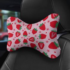 the seat cushion has strawberries on it