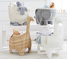 three wicker baskets with stuffed animals in them