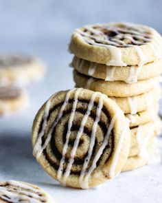 a stack of cookies with icing on top