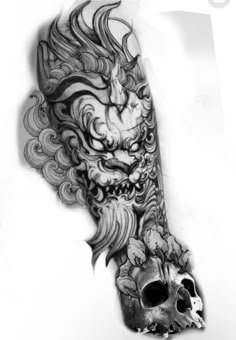 a black and white photo of a skull with a dragon tattoo on it's arm